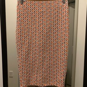 Zara skirt. Orange, cream & black details